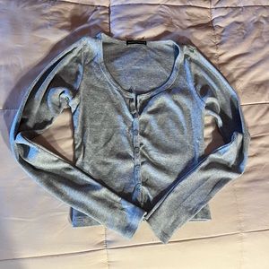 gray long sleeve button down shirt